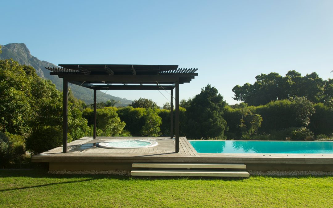 Sunny luxury hot tub and swimming pool